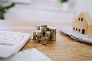 Close up of money stack coins and Dollar banknotes Saving money financial banking concept